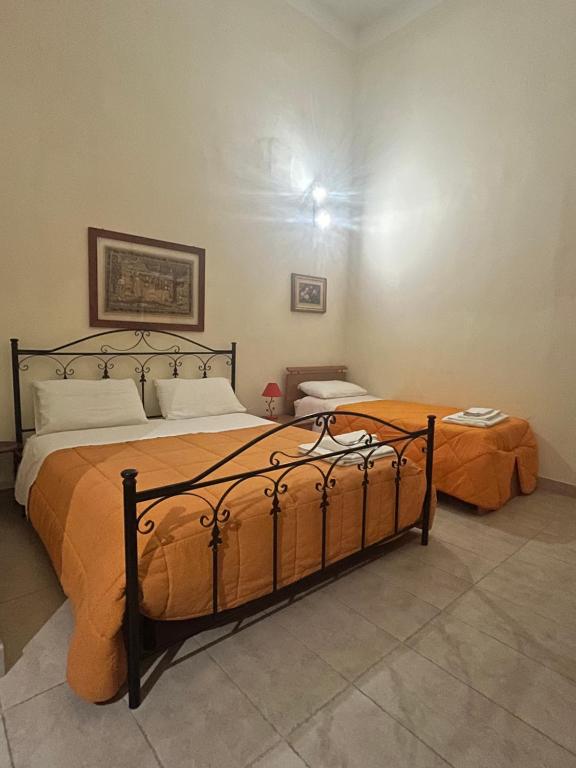 Postel nebo postele na pokoji v ubytování Salento b&b Trepuzzi
