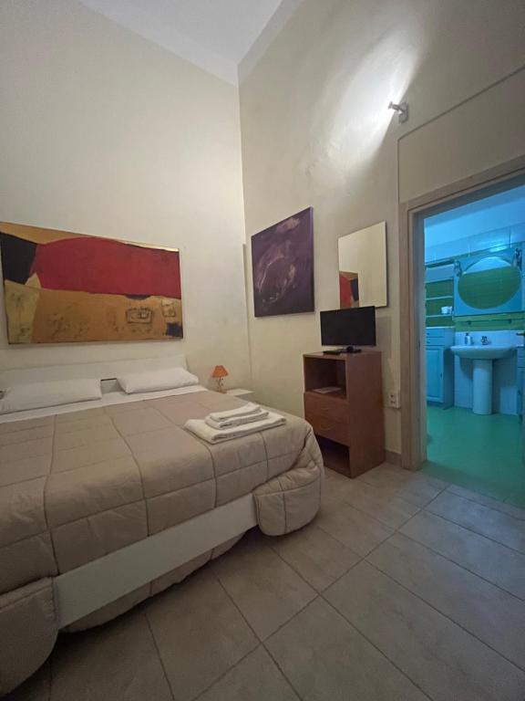 Postel nebo postele na pokoji v ubytování Salento b&b Trepuzzi