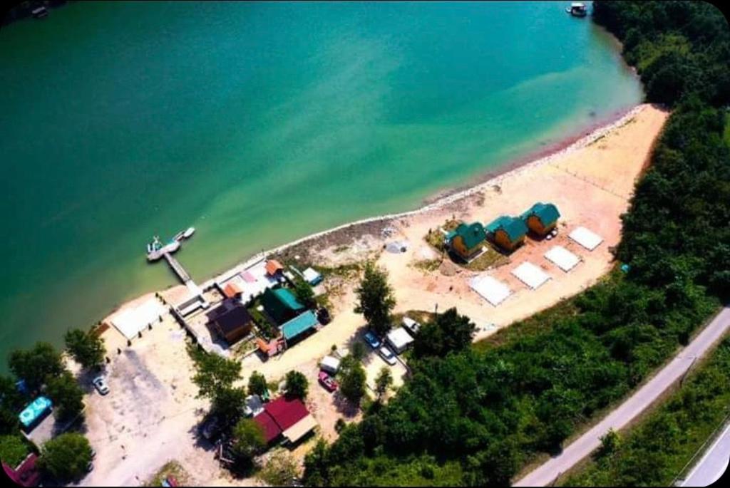 an aerial view of an island with a group of tents at Stara pruga Jaz 2 in Višegrad