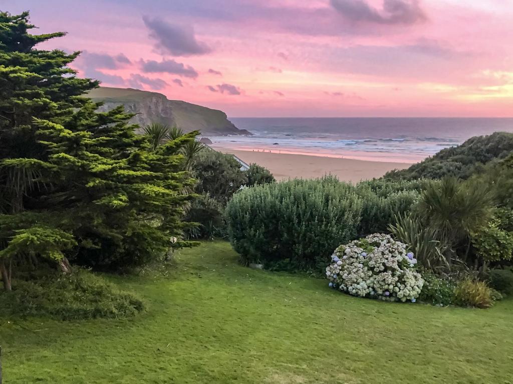 a view of the beach from the house at Blue Seas in Mawgan Porth