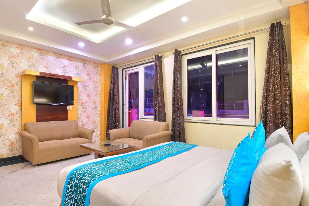 Llit o llits en una habitació de Hari Piorko Inn - Just a min away from New Delhi Railway Station