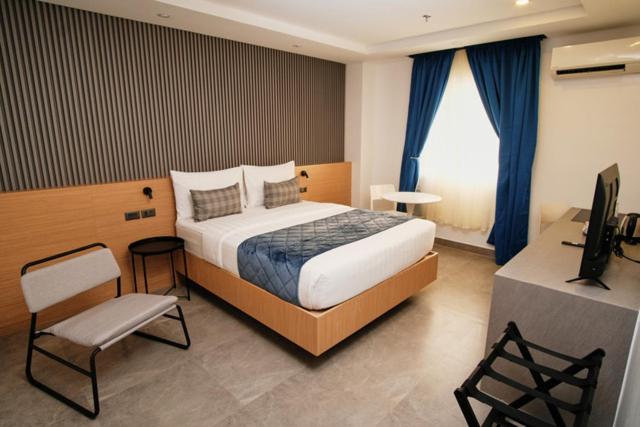 Postel nebo postele na pokoji v ubytování Casa Veles Hotel