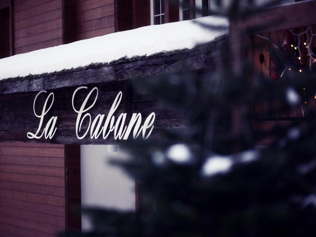 Certifikát, hodnocení, plakát nebo jiný dokument vystavený v ubytování Boutique Hotel La Cabane