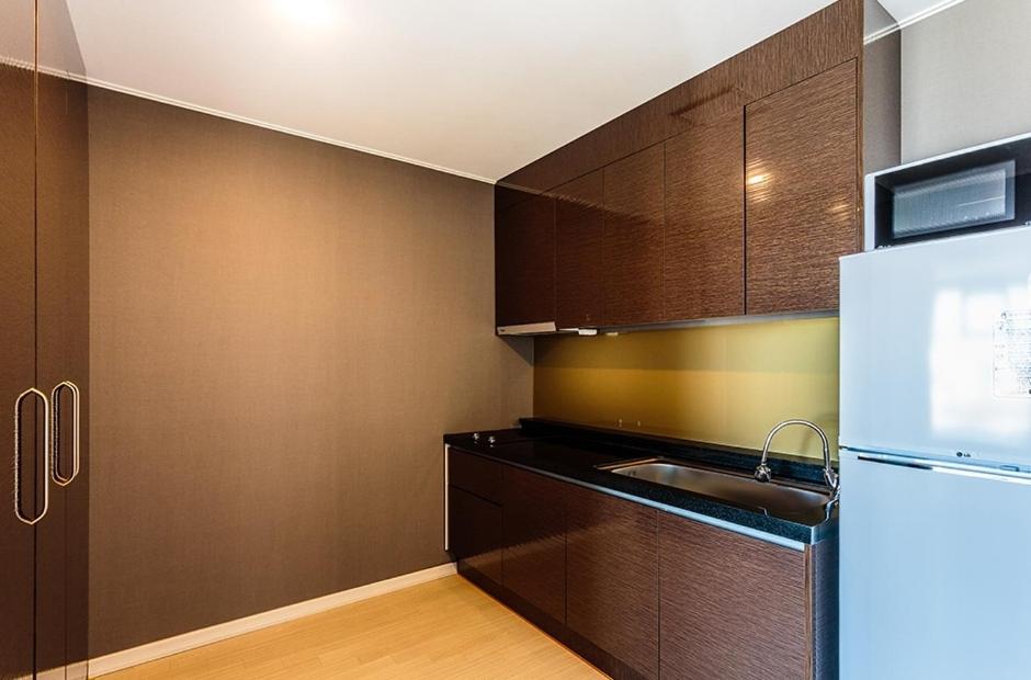 Kuchyň nebo kuchyňský kout v ubytování Rich Hotel