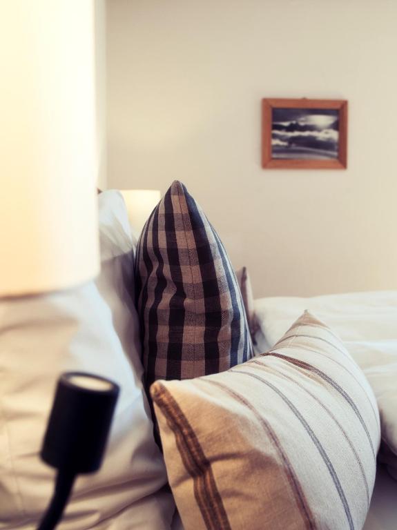 Postel nebo postele na pokoji v ubytování Boutique Hotel La Cabane