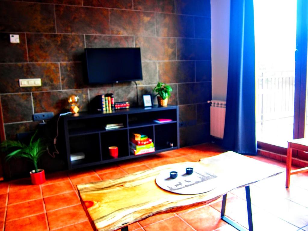 A television and/or entertainment centre at Las Colmenillas 1