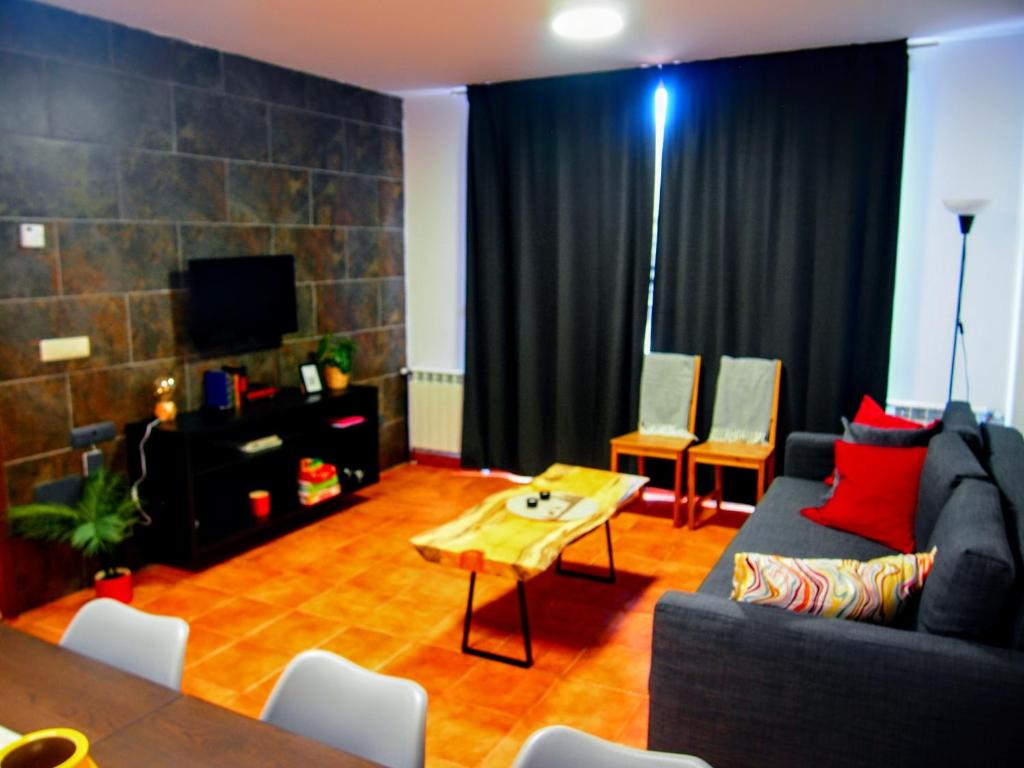 A television and/or entertainment centre at Las Colmenillas 1