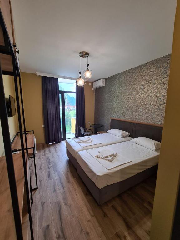 Postel nebo postele na pokoji v ubytování Casa Del Mar