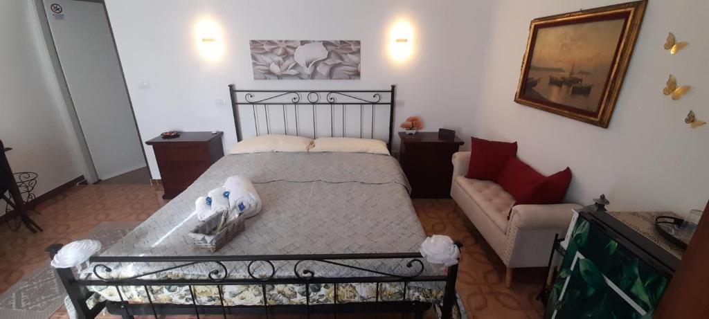Postel nebo postele na pokoji v ubytování I Cappuccini B&B