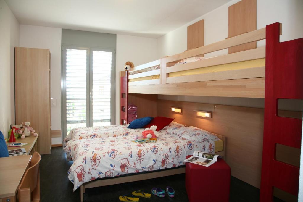Postel nebo postele na pokoji v ubytování Lugano Savosa Youth Hostel
