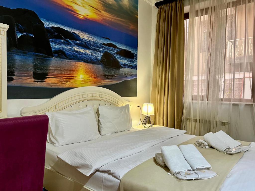 Voodi või voodid majutusasutuse Family Hotel toas