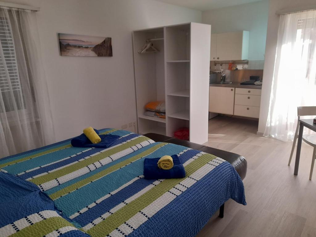 Postel nebo postele na pokoji v ubytování Appartamento Elisabetta