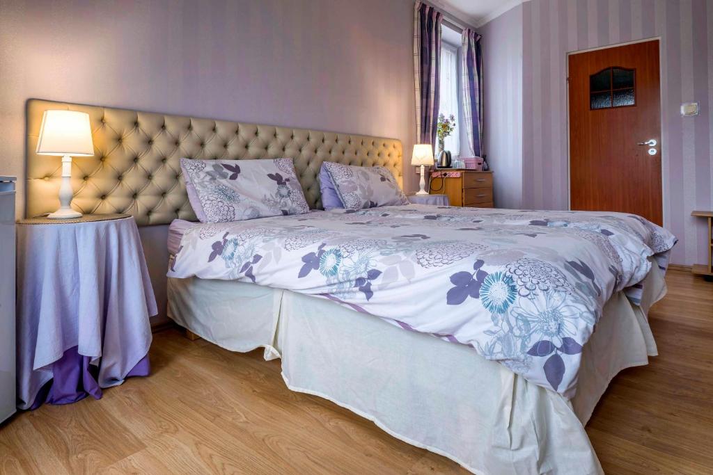 Postel nebo postele na pokoji v ubytování Pensjonat nad jeziorem Lakeside