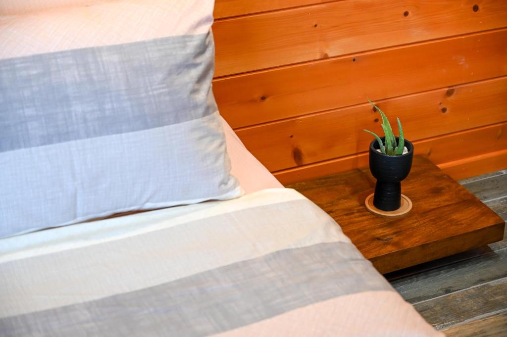 Postel nebo postele na pokoji v ubytování VB ECO SUITES
