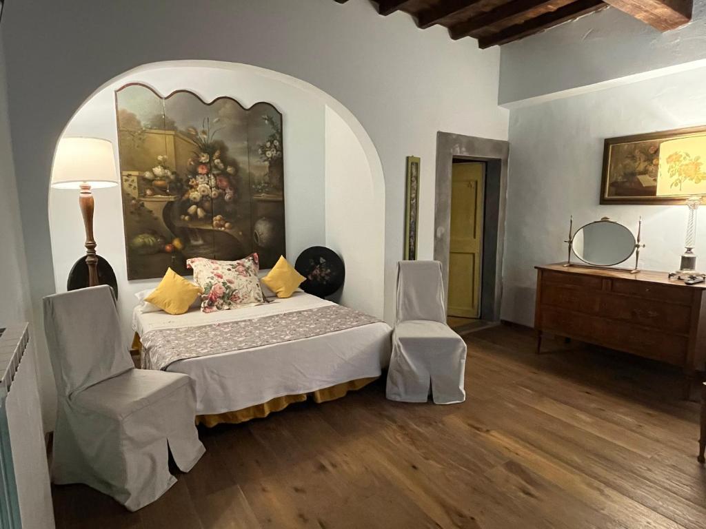 A bed or beds in a room at B&B Alla Corte dei Medici