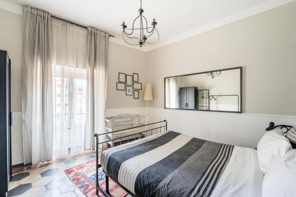 Łóżko lub łóżka w pokoju w obiekcie Trastevere Stylish