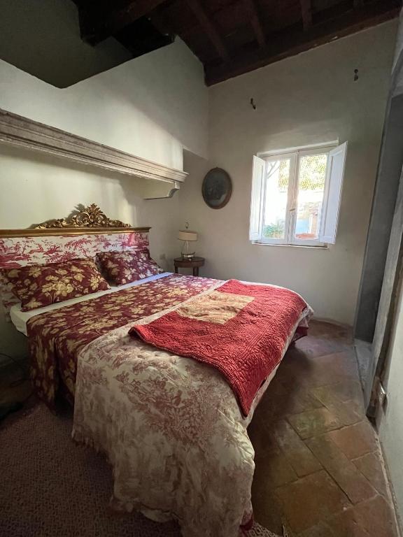A bed or beds in a room at B&B Alla Corte dei Medici