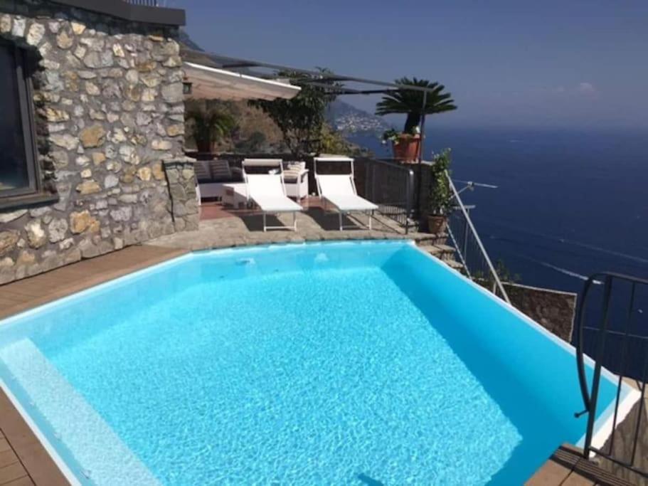 Bazén v ubytování Villa Stone - De Vivo Realty Positano nebo v jeho okolí