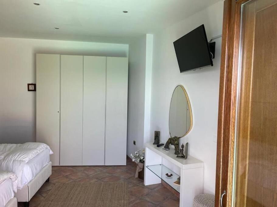 Postel nebo postele na pokoji v ubytování Villa Stone - De Vivo Realty Positano