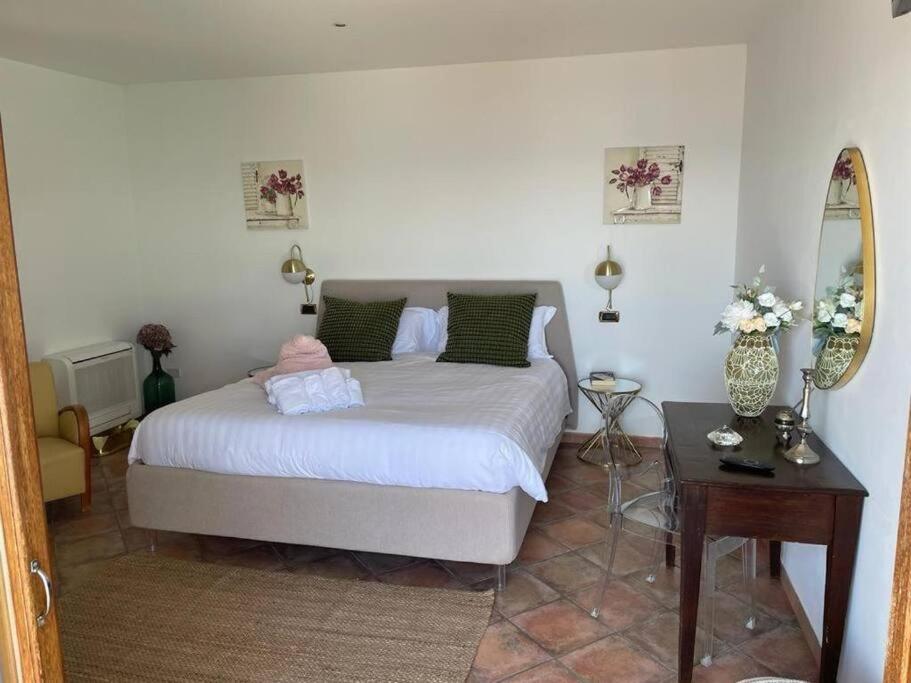 Postel nebo postele na pokoji v ubytování Villa Stone - De Vivo Realty Positano