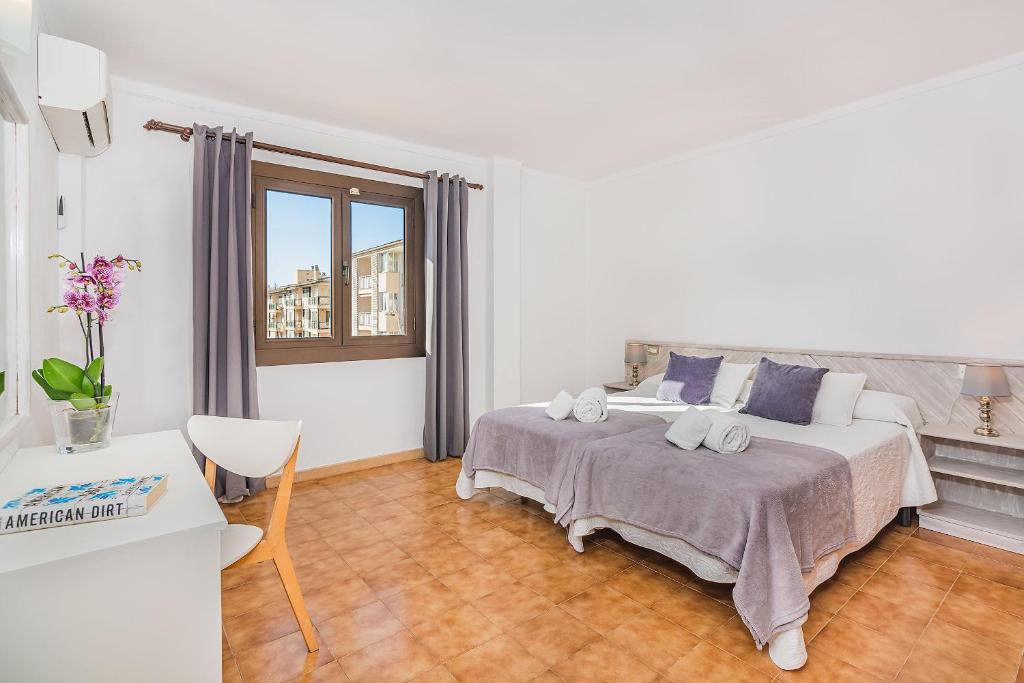 Postel nebo postele na pokoji v ubytování Apartamentos Bressol