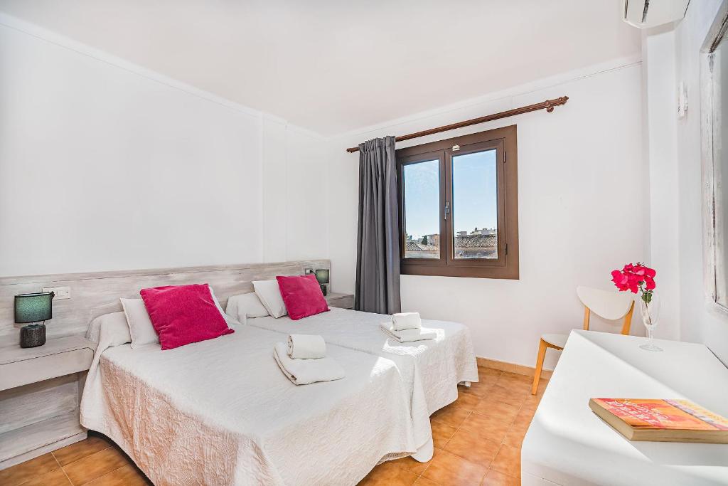Postel nebo postele na pokoji v ubytování Apartamentos Bressol