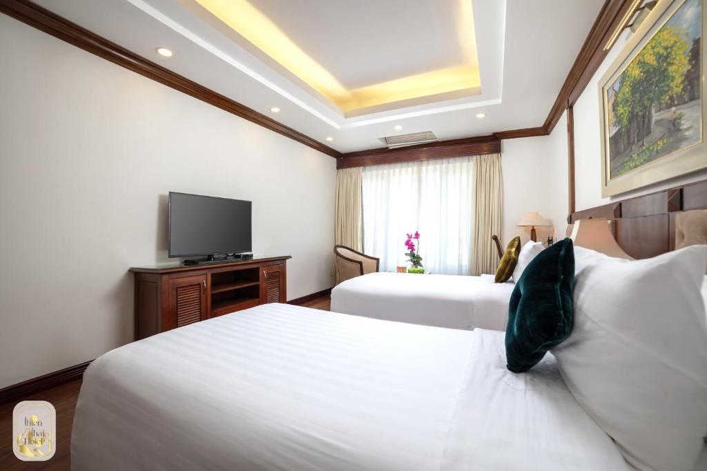 Queen room with 2 queen beds city view + Free Afternoon Tea
