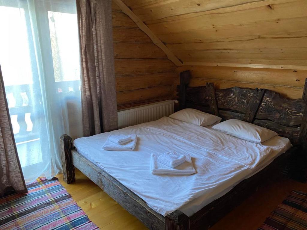 Postel nebo postele na pokoji v ubytování Шепіт річки