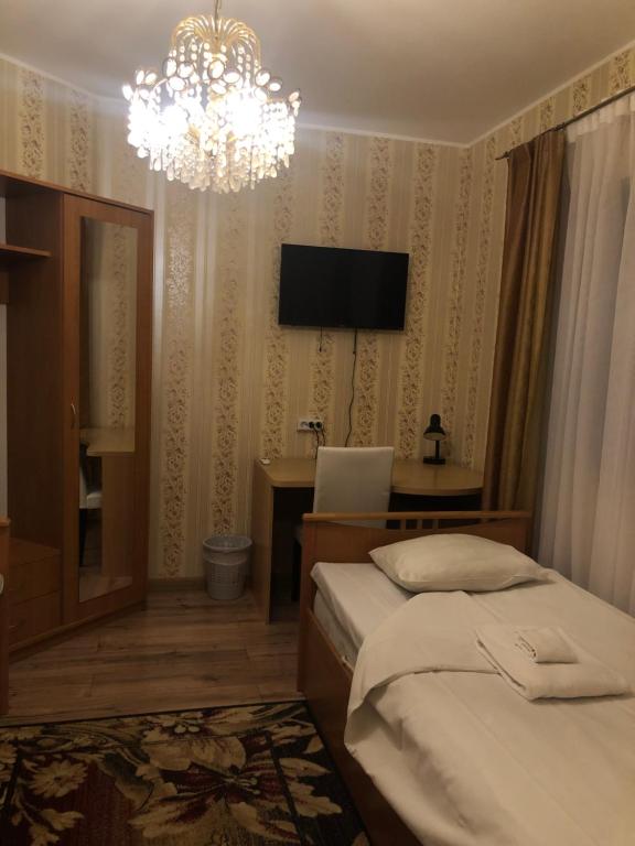 Postel nebo postele na pokoji v ubytování Riia Villa