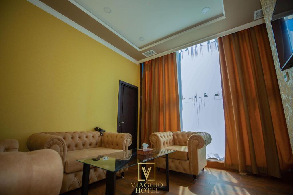 TV a/nebo společenská místnost v ubytování Hotel Viaggio