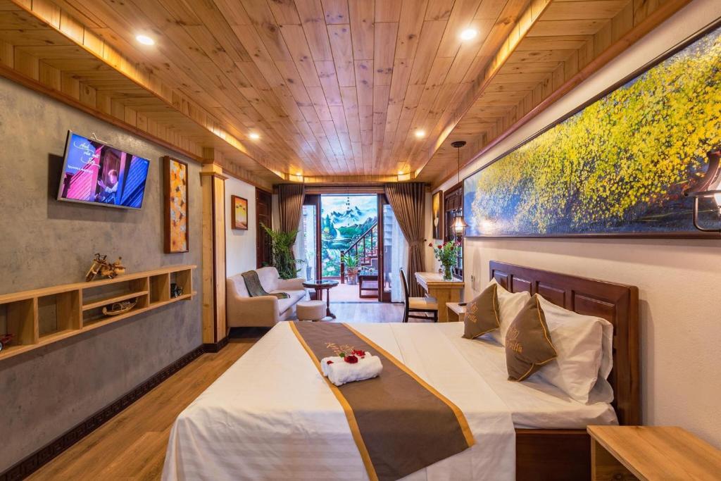 TV a/nebo společenská místnost v ubytování Art Villa Hoi An