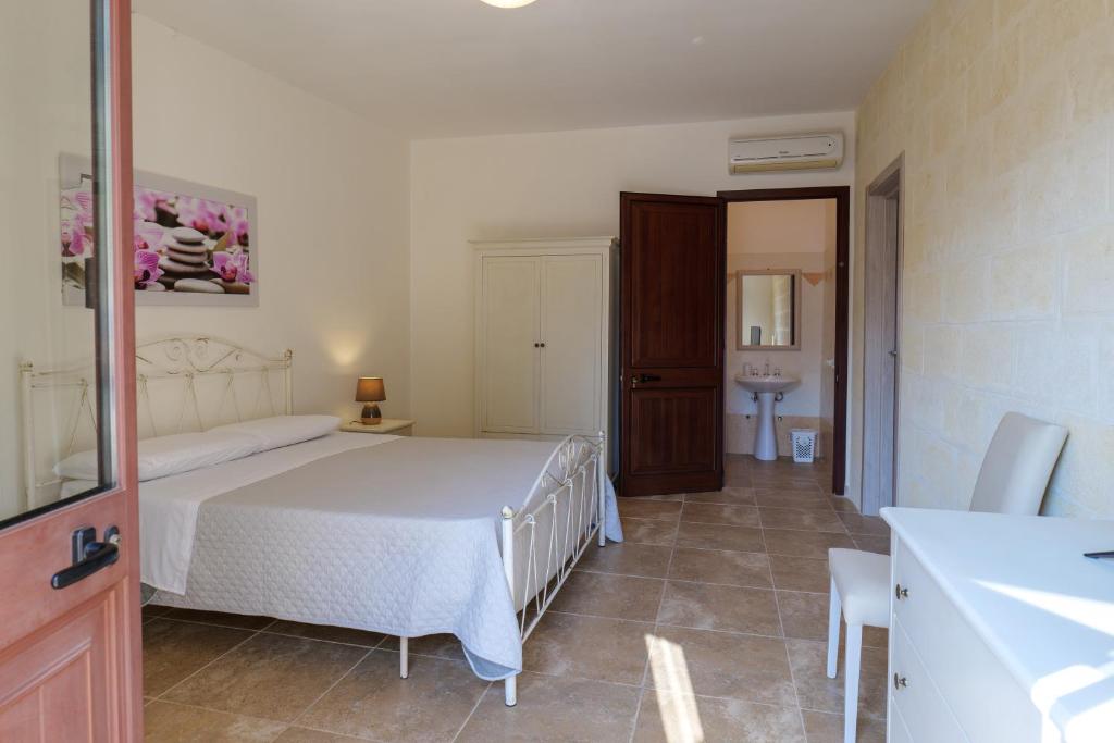 A bed or beds in a room at masseria Furca