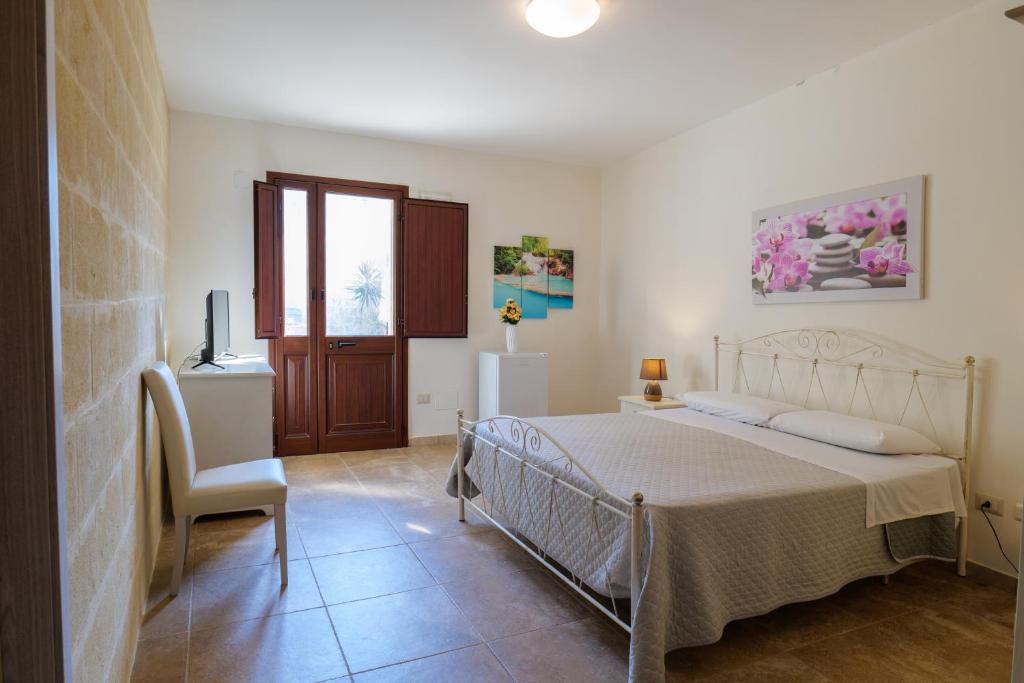 A bed or beds in a room at masseria Furca