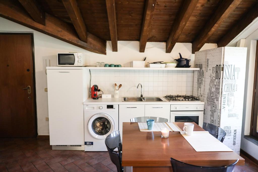 Kuchyň nebo kuchyňský kout v ubytování Piccinardi house - appartamento 4 posti letto