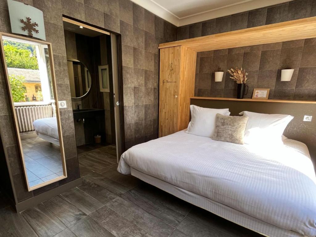 Postel nebo postele na pokoji v ubytování Hôtel La Rencluse