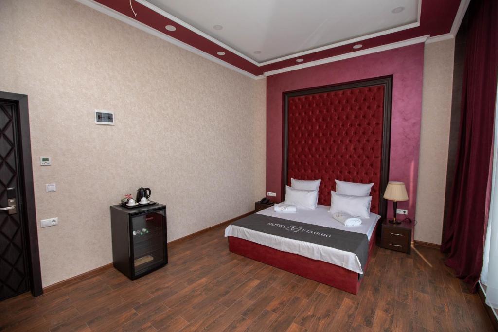 Postel nebo postele na pokoji v ubytování Hotel Viaggio