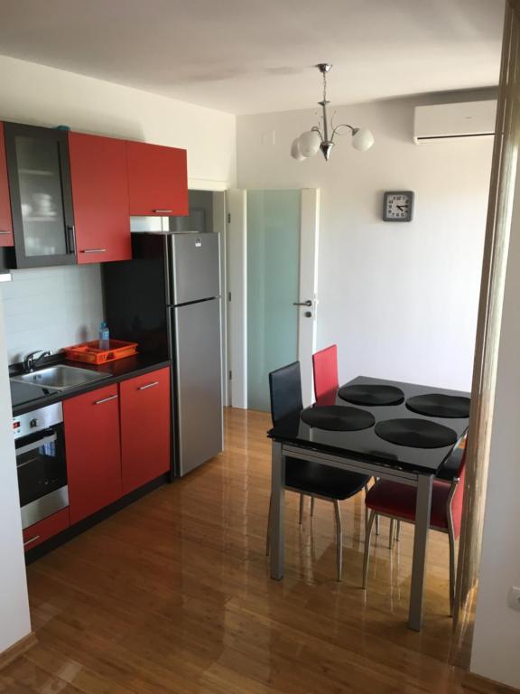 Kuchyň nebo kuchyňský kout v ubytování Apartment Tihana