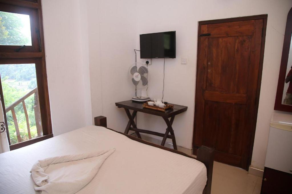 TV a/nebo společenská místnost v ubytování Ornateview Hotel