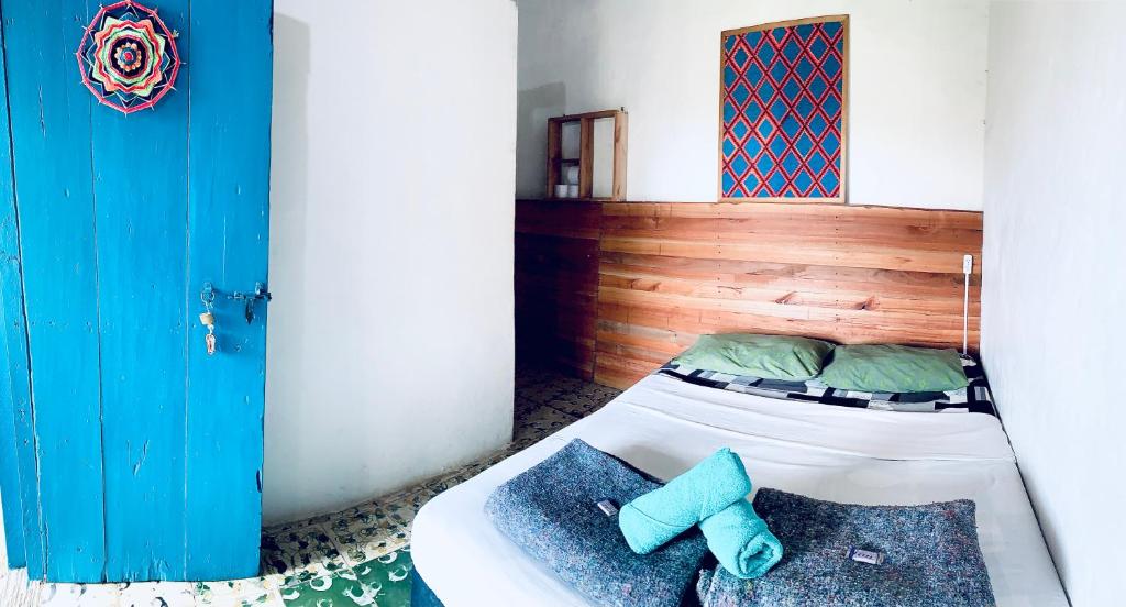 Postel nebo postele na pokoji v ubytování Parcerito's Hostel