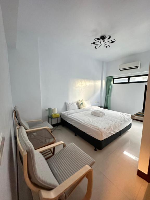 Postel nebo postele na pokoji v ubytování Elk Kitten Homestay