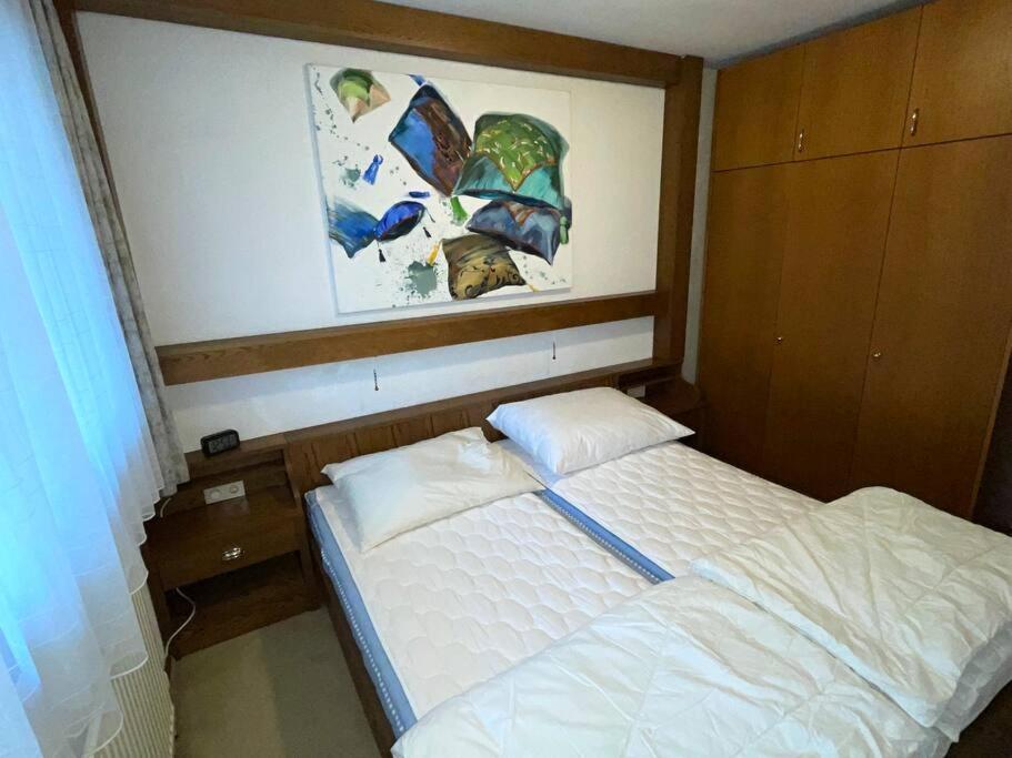 Postel nebo postele na pokoji v ubytování Apartment Eva - Hinterthal