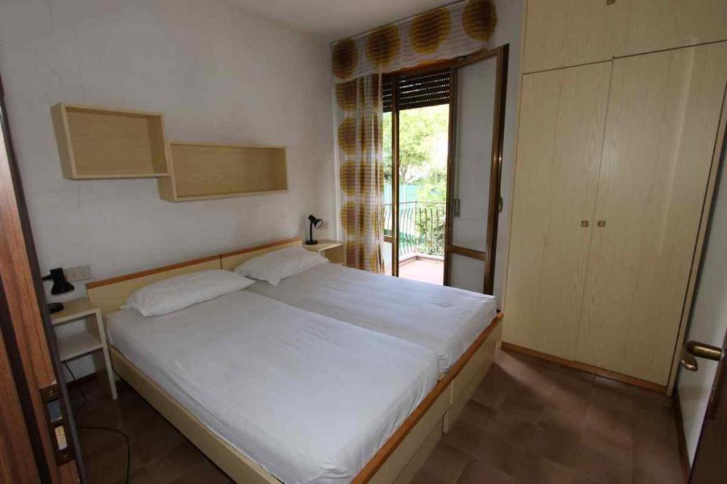 Postel nebo postele na pokoji v ubytování Residences La Rustica & Elite
