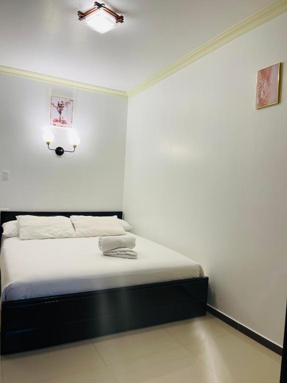 Postel nebo postele na pokoji v ubytování Hostal Balcon del Cielo