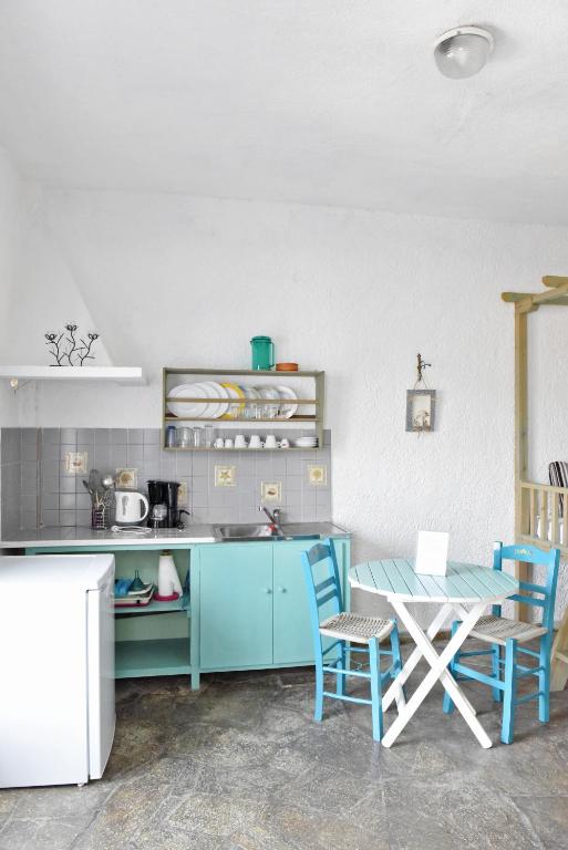 Kuchyň nebo kuchyňský kout v ubytování Mantos rooms 1