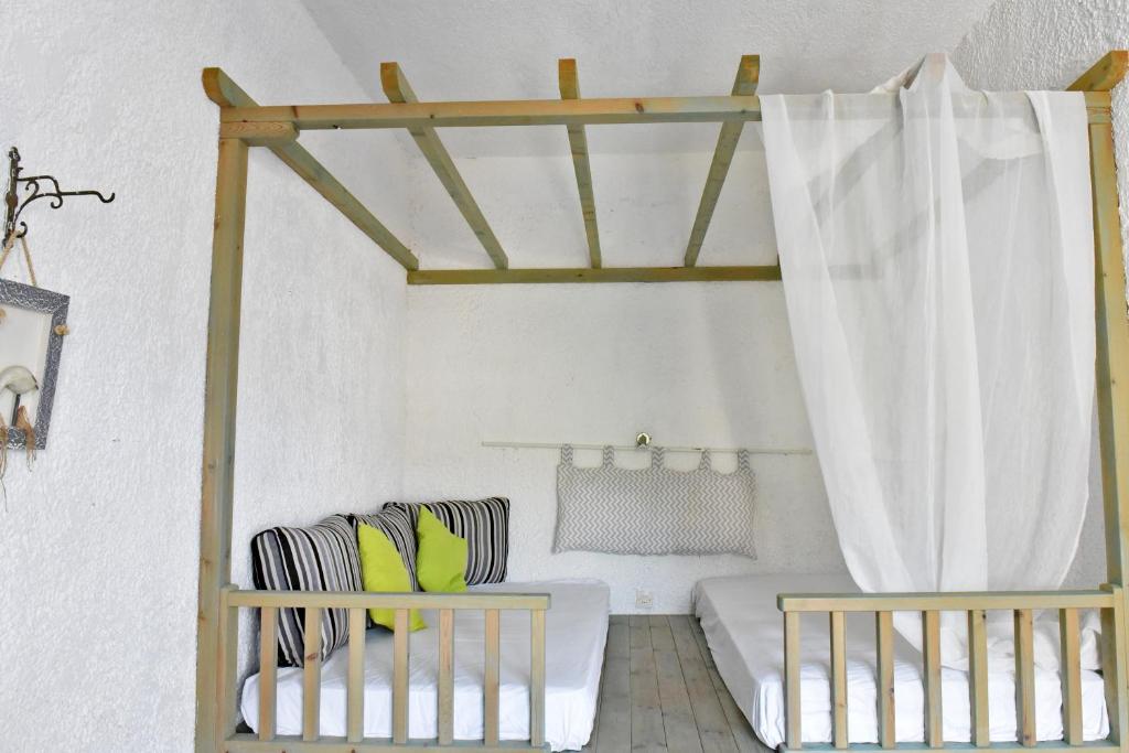 Postel nebo postele na pokoji v ubytování Mantos rooms 1