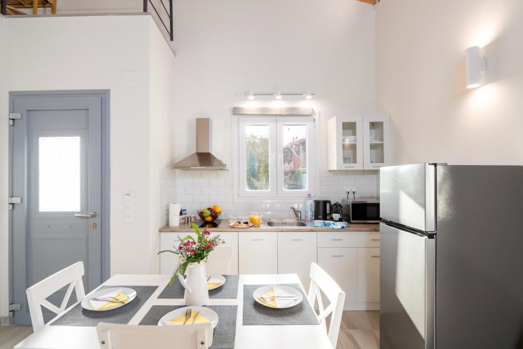 Kuchyň nebo kuchyňský kout v ubytování Windrose Apartments - Shared Pool