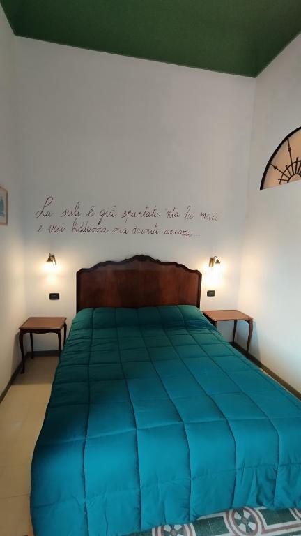 Postel nebo postele na pokoji v ubytování Le due Sicilie-Guest House