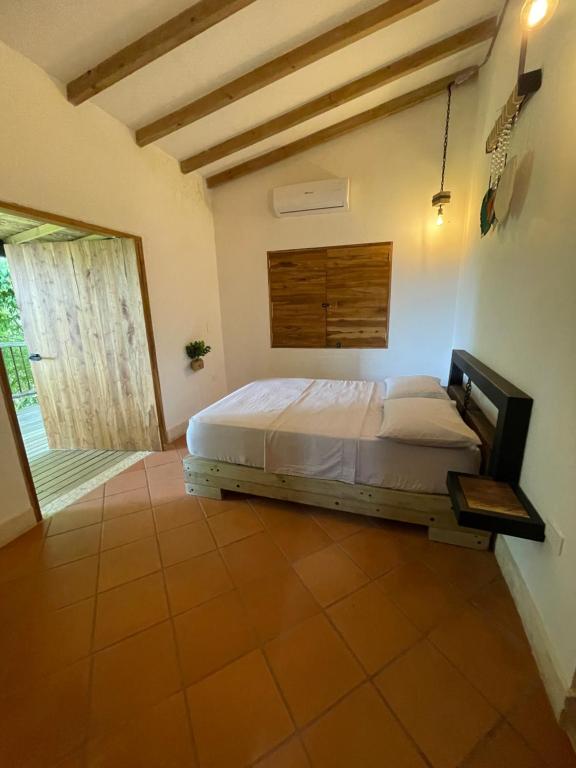 Postel nebo postele na pokoji v ubytování Finca Hotel el Valhalla