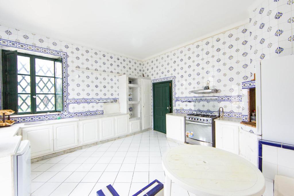 Kuchyň nebo kuchyňský kout v ubytování Arabesque House