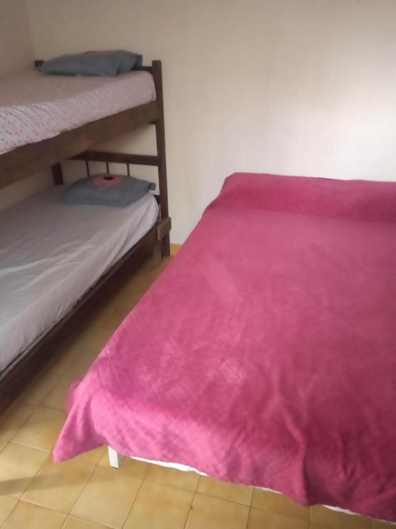 Postel nebo postele na pokoji v ubytování Departamento en patio interno